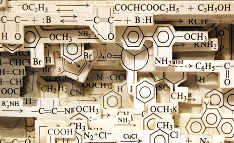 A mound of paper sheets filled with different chemical symbols, illustrating an investigation on various chemical formula